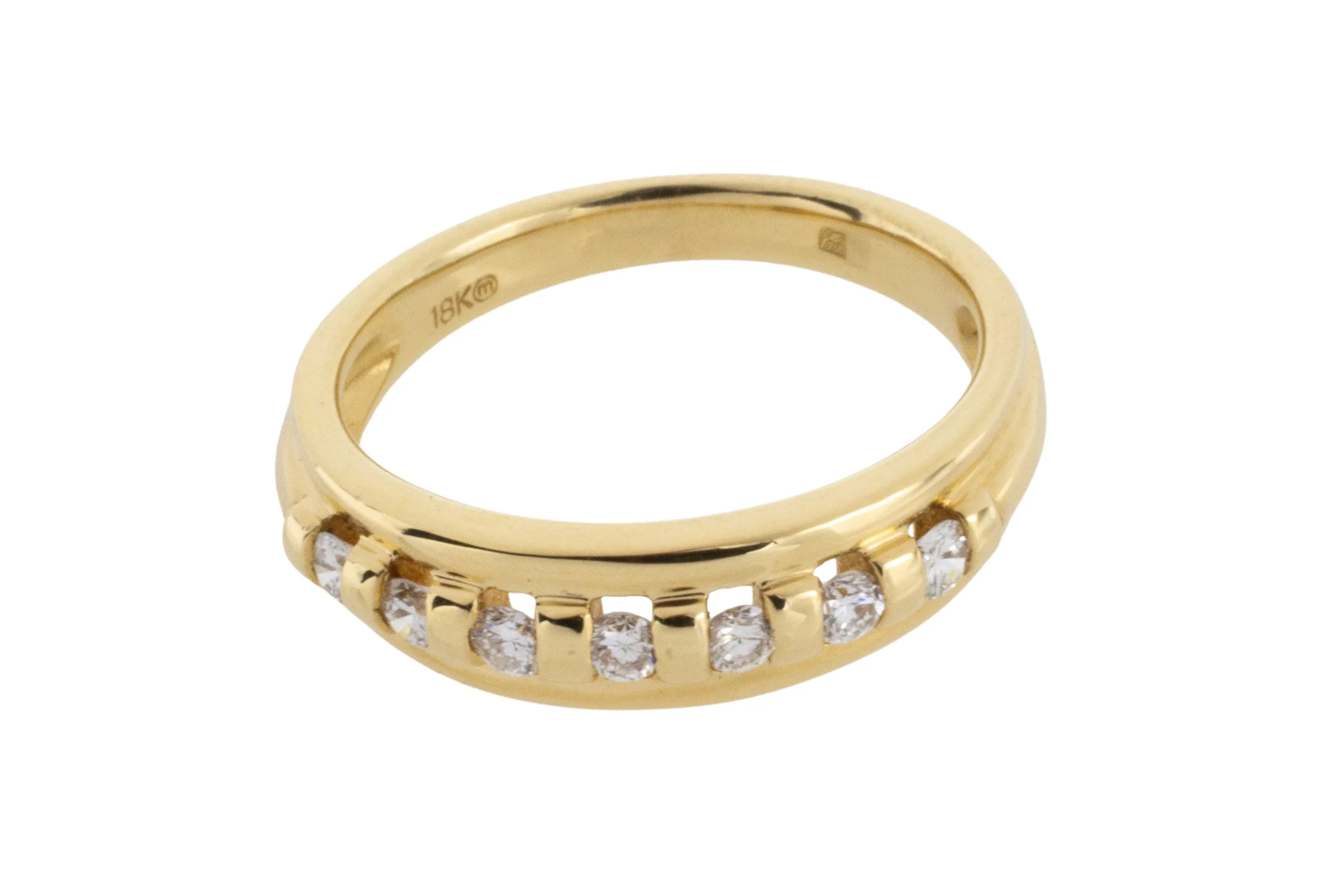18 carat gold band with brilliant cut diamonds