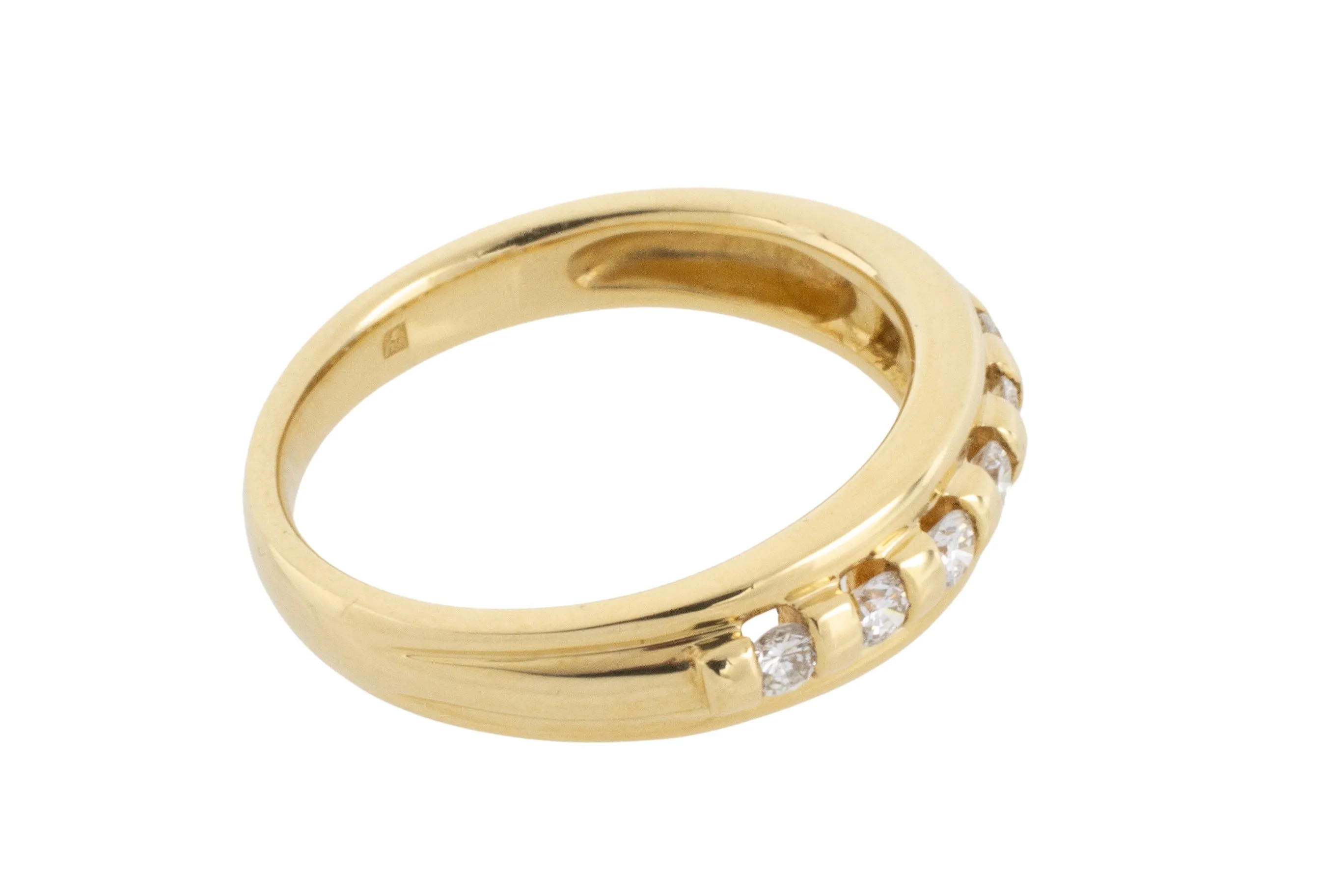 18 carat gold band with brilliant cut diamonds