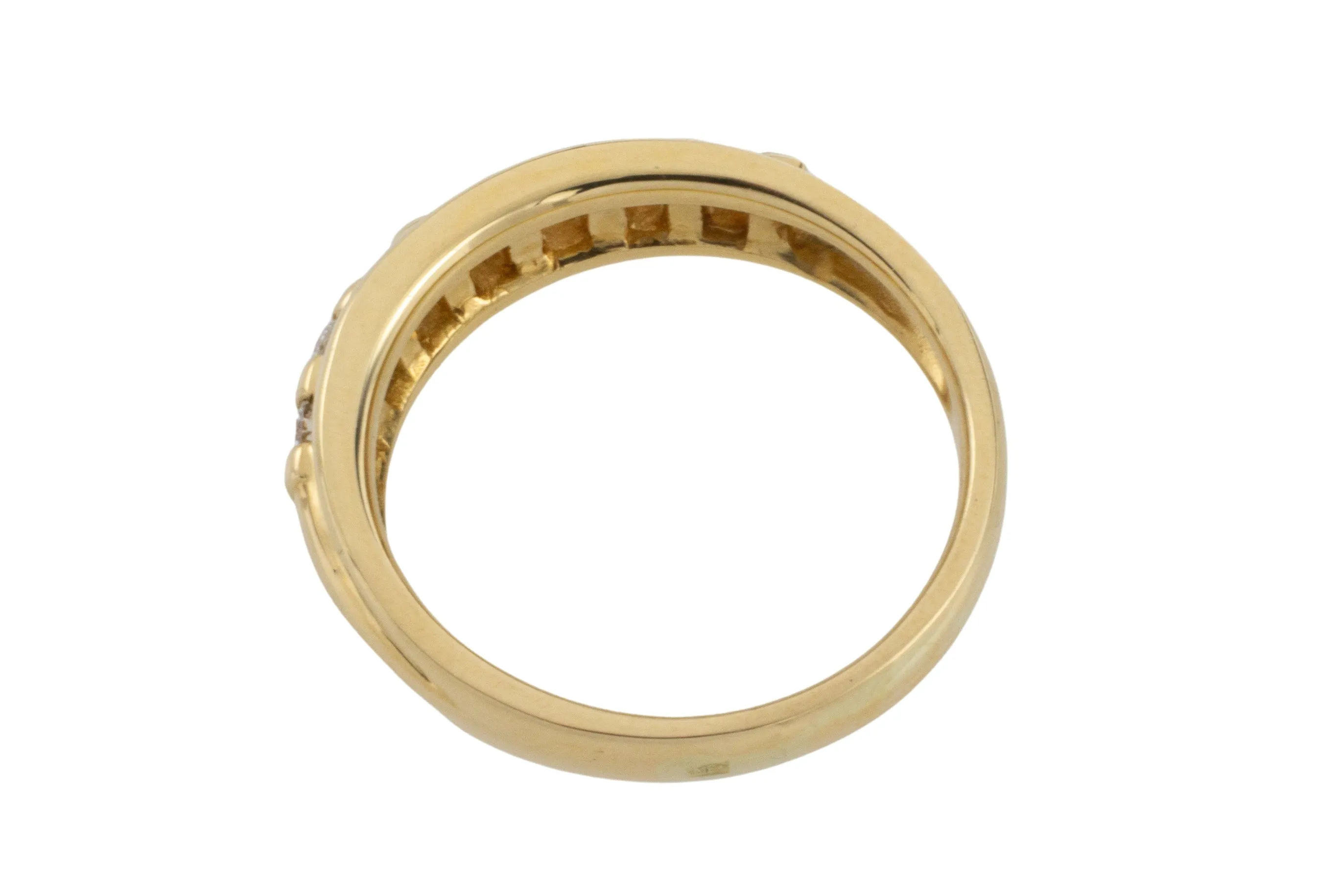 18 carat gold band with brilliant cut diamonds